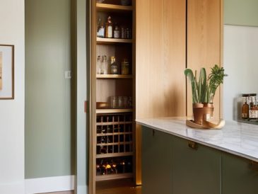 Sleek Hidden pantry "speakeasy" doors, stylish entry